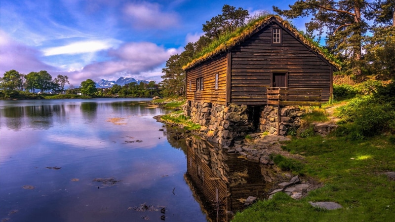 water, beach, outdoors, sea, vacation, landscape, town, building exterior, cloud - sky, holiday, trees, scandinavia, city, tree, coast, tourism, ancient