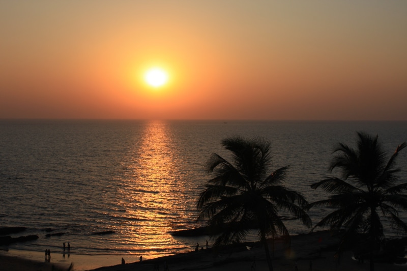 sun, idyllic, travel destinations, india, sunset, tree, tropical climate, beach, tranquility, beauty in nature, horizon, tranquil scene, sea, horizon over water