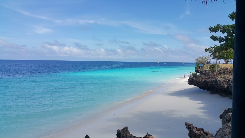 cloud - sky, holiday, land, water, zanzibar, tree, beauty in nature, no people, africa, beach, nature, day, blue, sea, plant, swimming pool, tranquil scene
