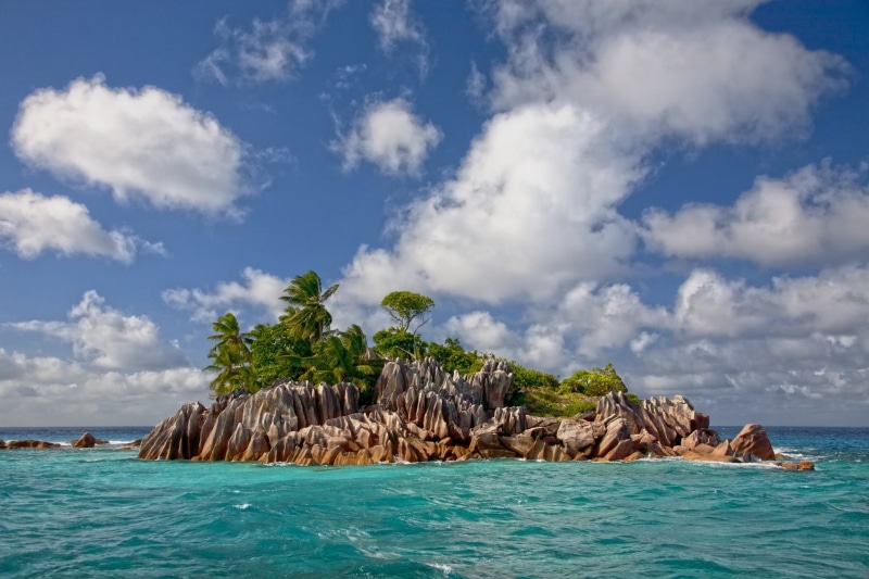 body, tranquility, outdoors, vacation, horizon over water, idyllic, tranquil scene, tropical, sea, beach, sky, water, beauty in nature, cloud - sky, nature