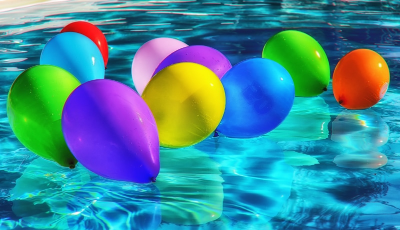 group of objects, floating on water, 5K, inflatable, vibrant color, celebrate, swimming pool, swim, summer, drive, floating, day, nature, multi colored