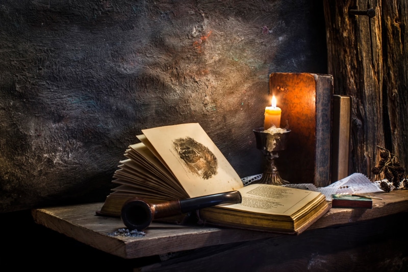 Peaceful times, book, electric lamp, belief, no people, wax, tube, the past, burning, pipe, history, wood - material, literature, flame, old, publication