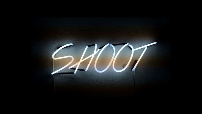 communication, neon, studio shot, single word, glowing, neon sign, western script, positive emotion, illuminated, black background, dark, capital letter