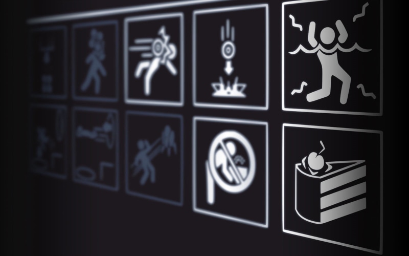 creativity, focus on foreground, warning signs, studio shot, equipment, black background, video games, indoors, animal representation, signs, blackboard