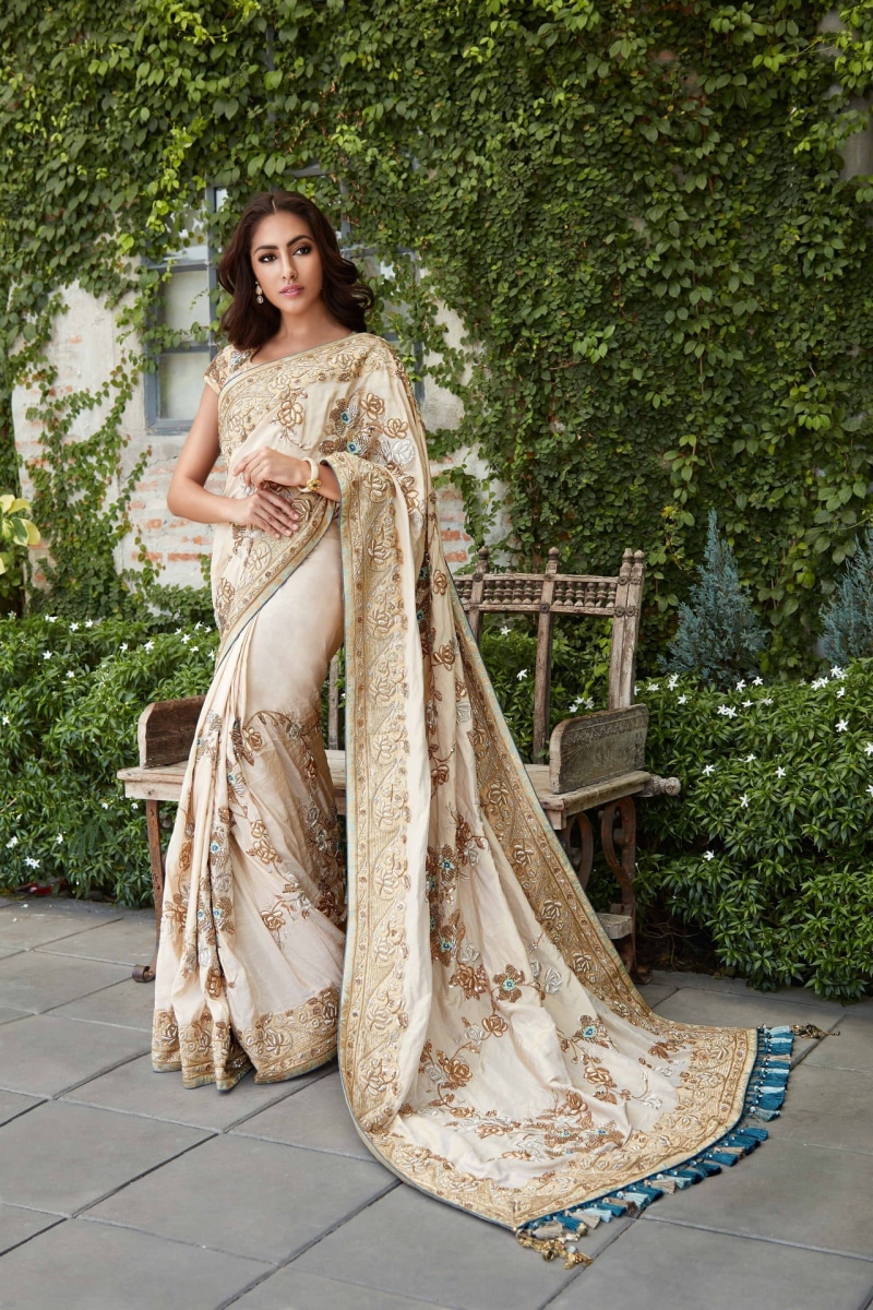 full length, buy sarees online in india, looking at camera, lifestyles, young adult, party wear sarees, adults only, sitting, wedding sarees, one woman only