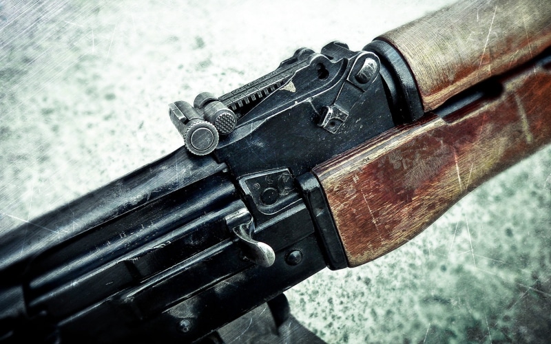 day, protection, 2K, machine gun, black, black color, government, selective focus, still life, gun, focus on foreground, communication, sign, bolt, aggression