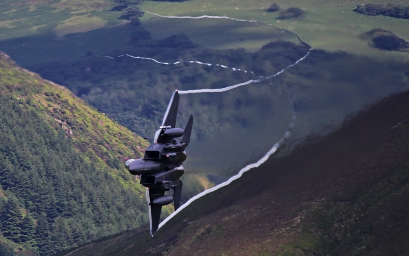 mountains, sky, military aircraft, transportation, aircraft, black, street, mode of transportation, flying, war, landscape, water, aerial view, fighter