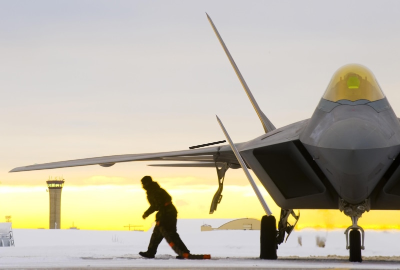 outdoors, nature, aerospace industry, travel, transportation, cold temperature, mode of transportation, air vehicle, yellow, airport, military, F-22 Raptor