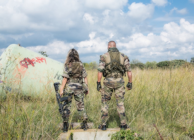 rear view, adult, camouflage, green, army Soldier, soldiers, grass, conflict, clothing, field, rifle, two, gun, woman, army, men in uniform, weapon, outdoors
