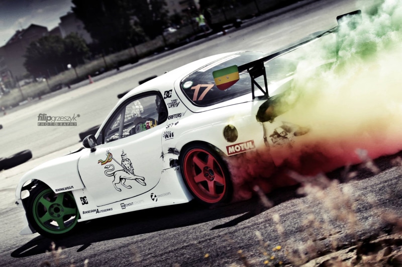 competitive sport, Mazda RX-7, Rastafari, sport, motor vehicle, motion, land vehicle, mazda, competition, text, transportation, close-up, rx, 1080P, mode of transportation