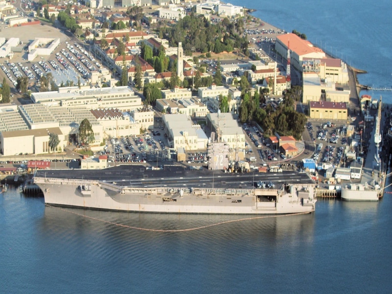 yacht, cityscape, mode of transportation, ship, nautical vessel, high angle view, residential district, no people, building, black, water, warship, harbor
