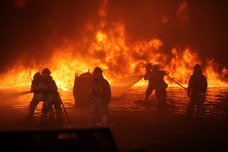 government, helmet, fire - natural phenomenon, firemen, occupation, communication, burning, warning sign, job, spraying, fire hose, flame, service, firefighter