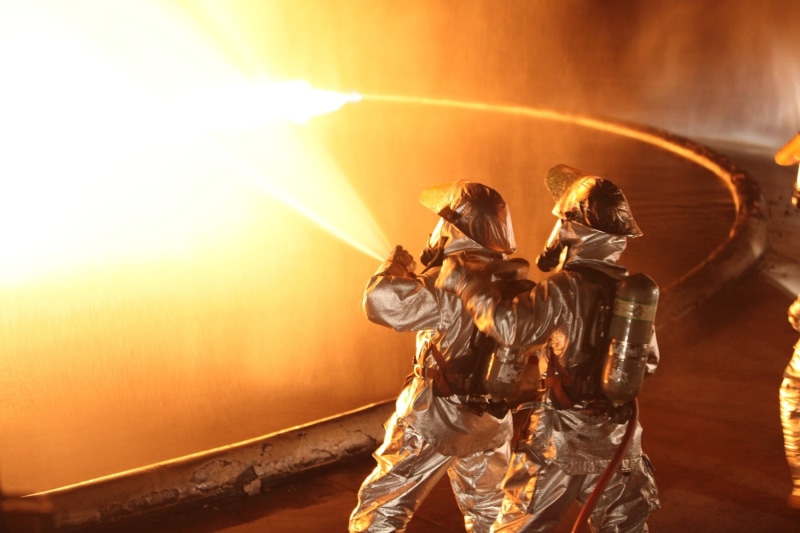 people, aircraft, cooperation, standing, helmet, holding, hose, men, government, outdoors, water, security, live, firemen, uniform, fire - Natural Phenomenon