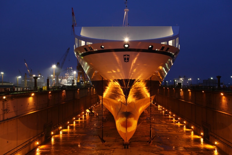 railing, no people, lights, cruiseship, outdoors, cranes (machine), sky, built structure, reflection, illuminated, shipyard, mode of transportation, ship