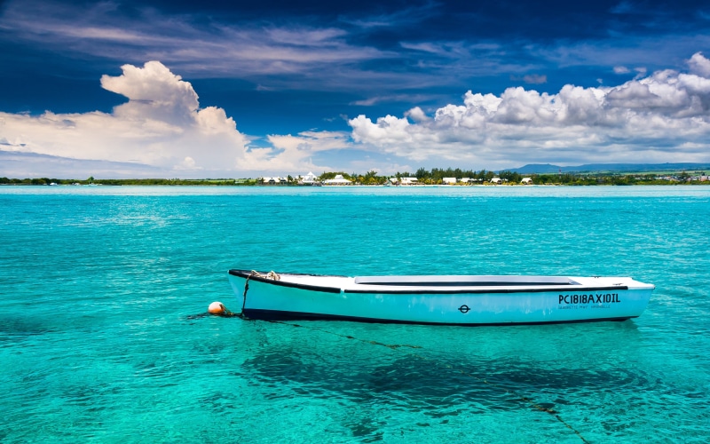 boat, Mauritius, transportation, no people, tranquility, cloud - sky, clouds, outdoors, island, beach, sea, mode of transportation, yacht, day, tranquil scene
