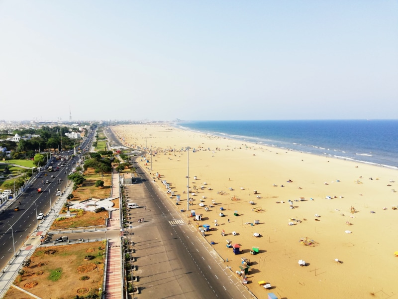 marina, water, high angle view, land vehicle, day, chennai lighthouse, nature, india, incidental people, transportation, beach, sand, horizon, car, madras