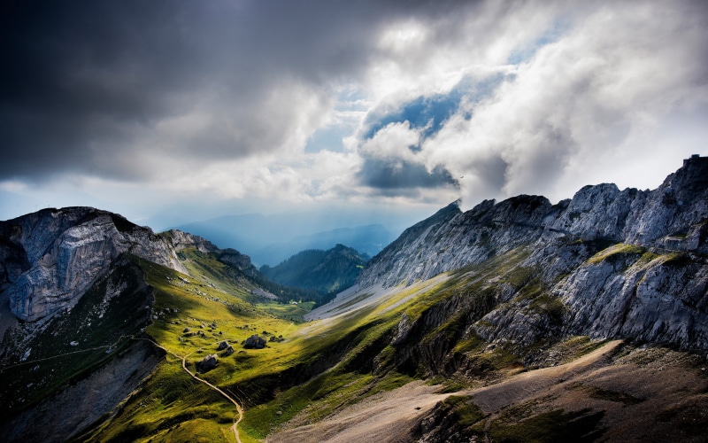rock - object, remote, overcast, scenics - nature, beauty in nature, environment, no people, formation, non-urban scene, tranquility, view, outdoors, mountain range