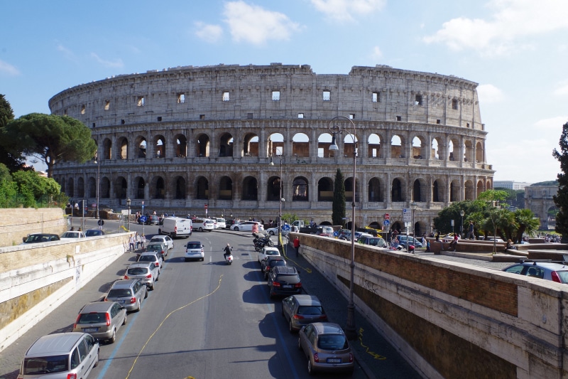 history, gladiatorial games, incidental people, the past, architecture, travel, built structure, rome, amphitheater, building, sky, nature, roman, tourism