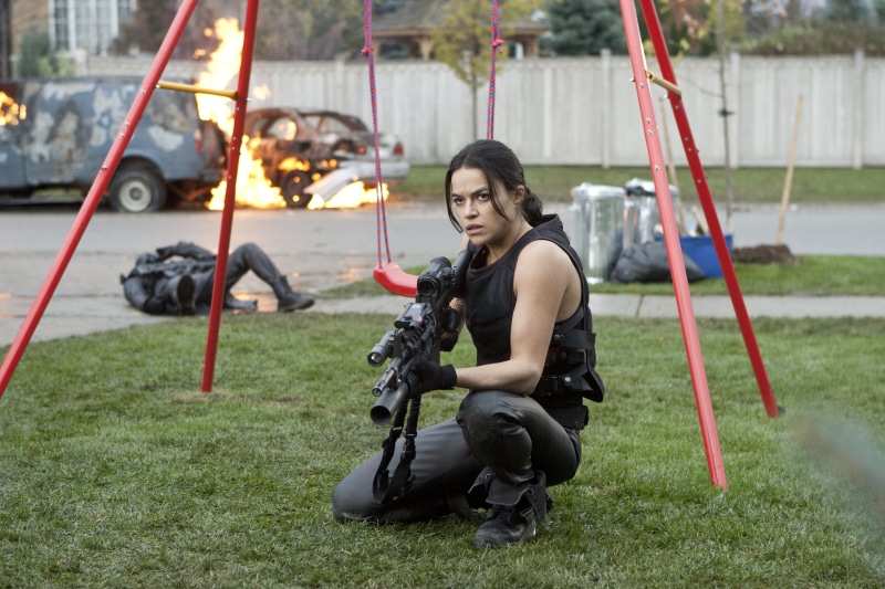 grass, women, casual clothing, adult, land vehicle, day, Michelle Rodriguez, lifestyles, young adult, nature, sitting, real people, wheel, rodriguez, one person