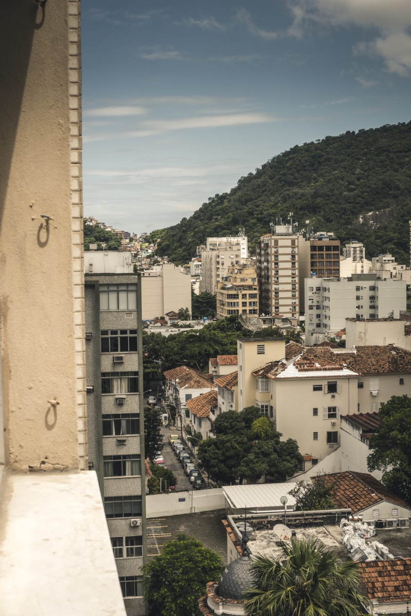 outdoors, view, sunlight, house, street, building exterior, sky, day, riodejaneiro, high angle view, built structure, residential district, roomview, rio