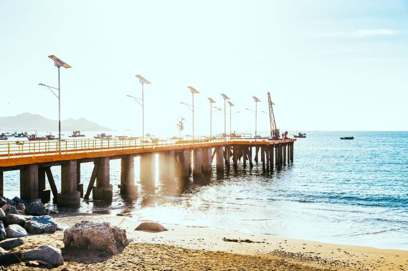 horizon over water, day, outdoors, nature, pier, horizon, scenics - nature, chile, bridge, clear sky, sky, architecture, water, sea, boats, taltal, tranquil scene