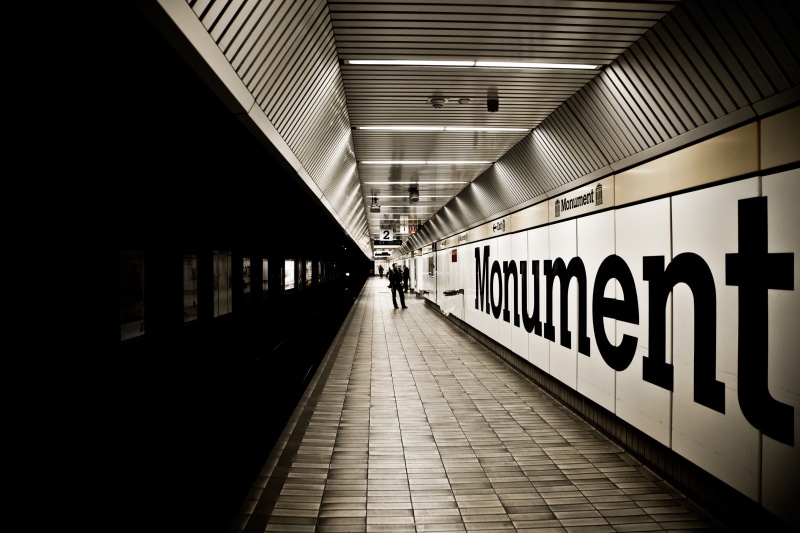 indoors, s bahn, men, subway Train, one person, walking, built structure, real people, hallway, rear view, arcade, diminishing perspective, incidental people
