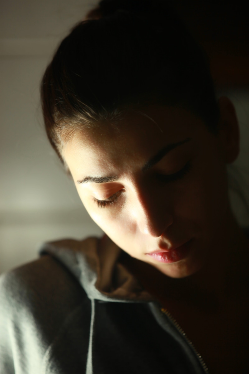disease, violence, portrait, victim, women, sad, disappointment, charm, lifestyles, repression, shot, exclusion, contemplation, face, casual clothing, looking down