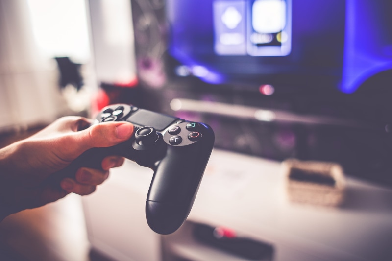 lazy, motor vehicle, finger, indoors, mode of transportation, transportation, Games, time, ps4, play, match, one person, car, holding, people, adult, arts culture and entertainment