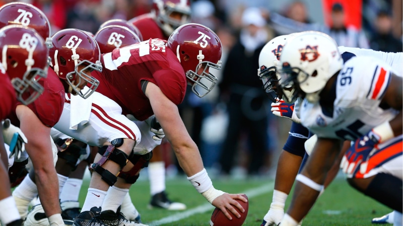 american football player, american football - ball, stadium, clothing, playing Field, versus, rivalry, team Sport, match, helmet, sports Uniform, men, sports Clothing