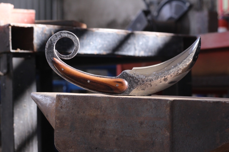 brut forge, cut, knife, metal, market, container, selective focus, close-up, indoors, old, bladesmith, 5K, no people, still life, business, sunlight, wood - material