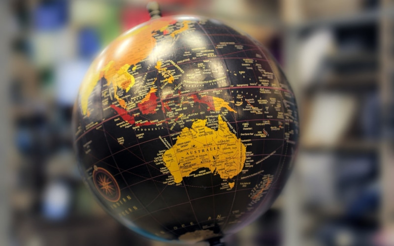 map, architecture, focus on foreground, desk, 1080P, day, planet earth, text, physical geography, planet - space, globes, close-up, continents, space