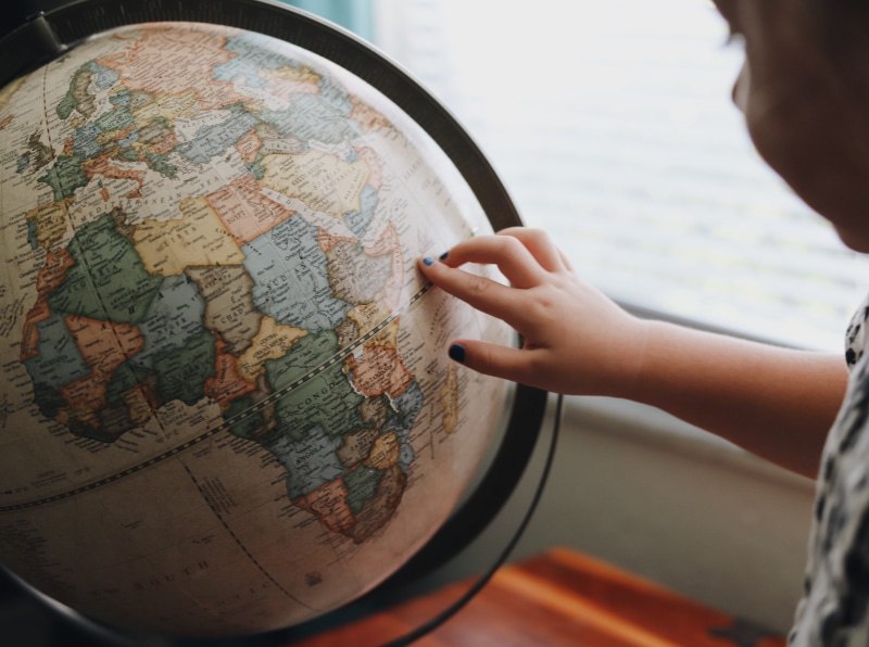world map, map, girl, globe, explore, one person, travel, touching, country, planet earth, direction, human hand, finger, close-up, lifestyles, globe - man made object