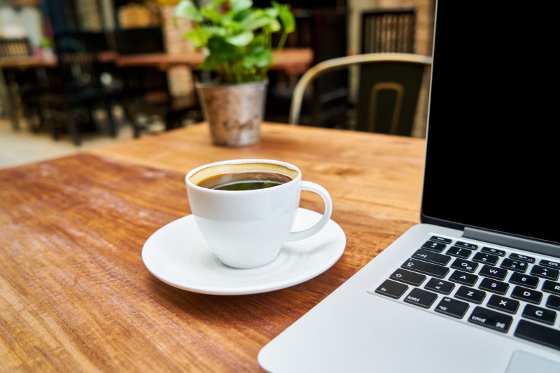 wooden table, refreshment, coffee cup, table, ceramic, computer, caffeine, cup, food photo, indoors, white, cappuccino, food, course, mug, photography