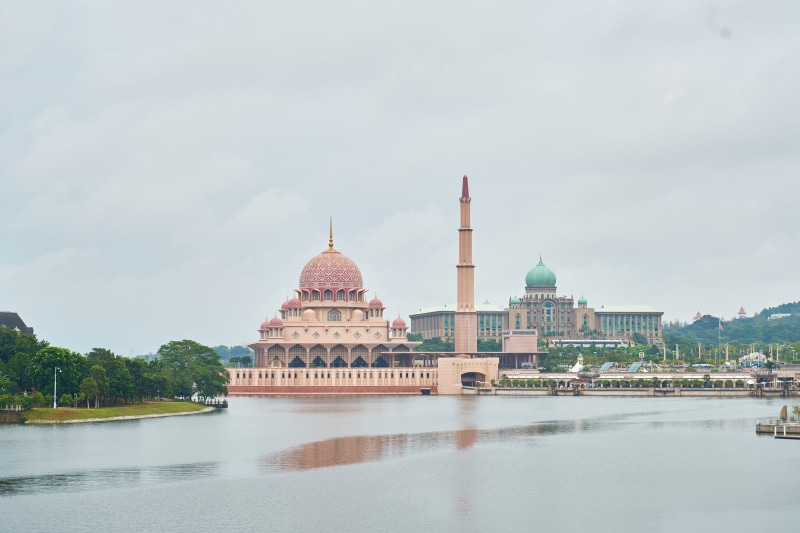 landscape, city, sky, waterfront, place of worship, belief, religion, built structure, building, water, worship, architecture, tree, daytime, islam, travel destinations