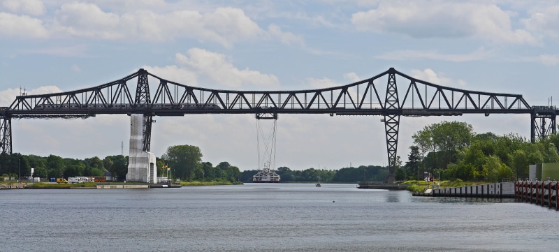 road, sky, Rendsburg, bridge - Man Made Structure, no people, steel, cityscape, mobile homes, transporter bridge, mode of transportation, transportation