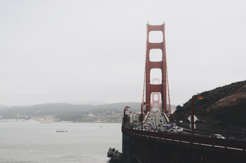 sausalito, transportation, sky, tourism, ocean, city, west coast, water, blue, mountain, no people, built structure, bridge - Man Made Structure, running