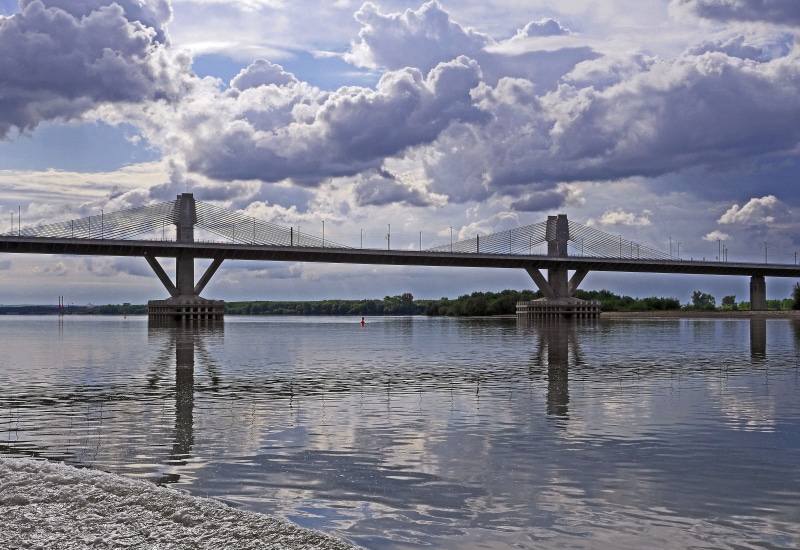 travel destinations, current, transit, storm clouds, partial view, concrete, bay, bridge - man made structure, city, engineering, passage, european union