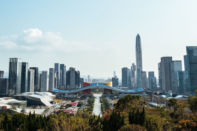 urban skyline, office, built structure, building exterior, office building exterior, outdoors, skyscraper, no people, china, apartment, plant, cloud - sky