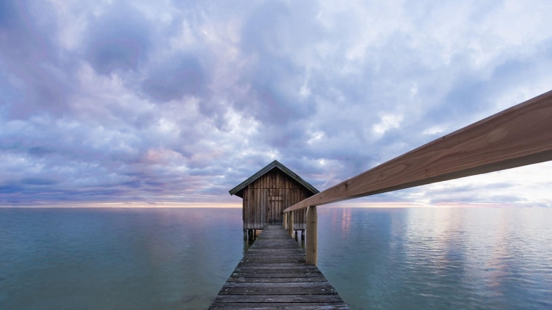 boat, landscape, beauty in nature, no people, wood - material, tourism, light, water, horizon over water, pier, sea, ocean, tranquil scene, coast, breakwater