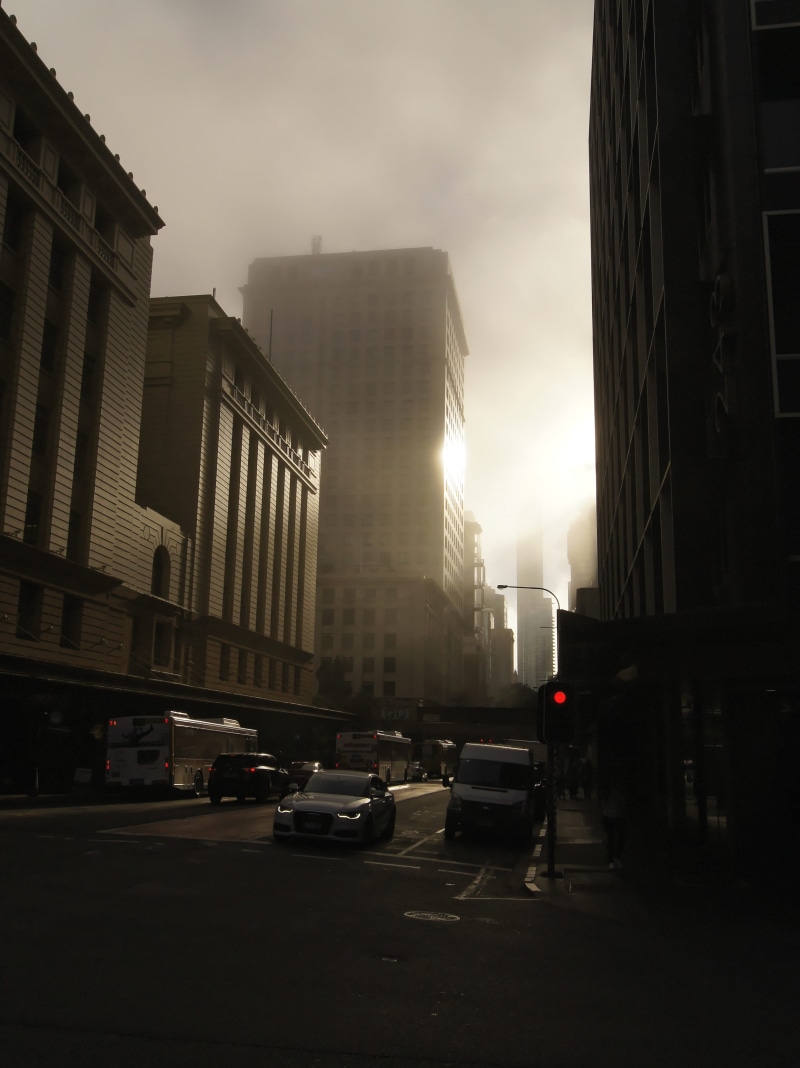 transportation, skyscraper, red light, sky, motor vehicle, mode of transportation, sunrise, nature, built structure, street, audi, no people, city life