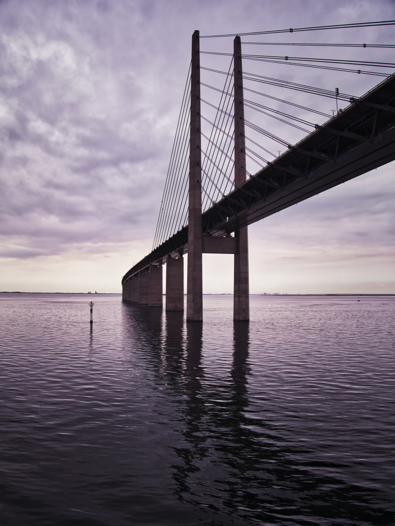 architecture, waterfront, cloud - sky, sky, tranquil scene, bay, connection, sunset, malmö, baltic sea, nature, öresund, bridge, engineering, scenics - nature