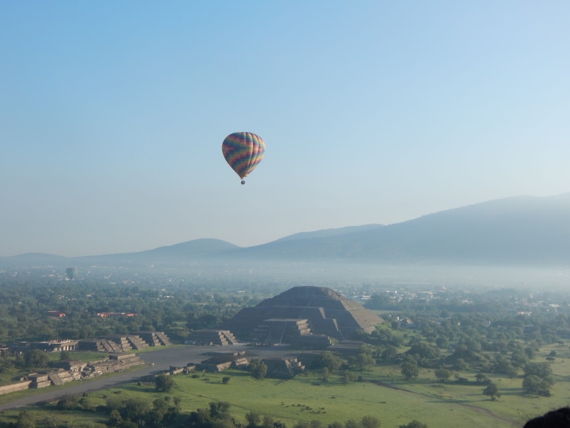 day, multicolored, nature, scenics - nature, balloon, 4K, hot air balloon, transportation, air, building exterior, hot, no people, travel, flying, landscape