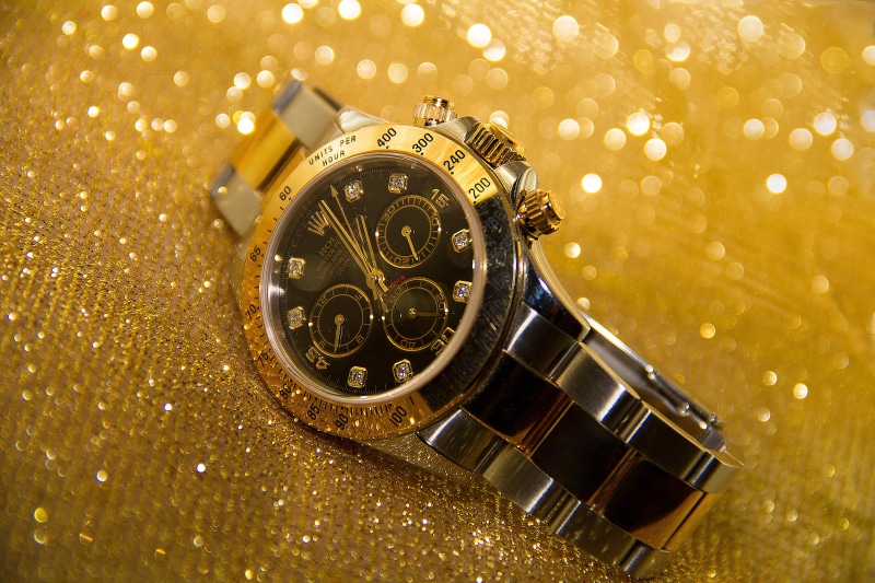 no people, gold, time indicating, studio shot, time, wealth, watch, round, wrist watch, black, pocket watch, silver colored, metal, shiny, clock face, glitter