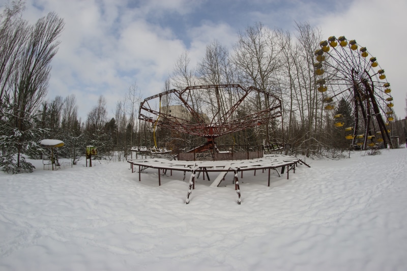 stalker, passenger cars, radioactive, ghost town, playground, bare tree, chernobyl, beauty in nature, plant, cold temperature, land, merry-go-round, urban