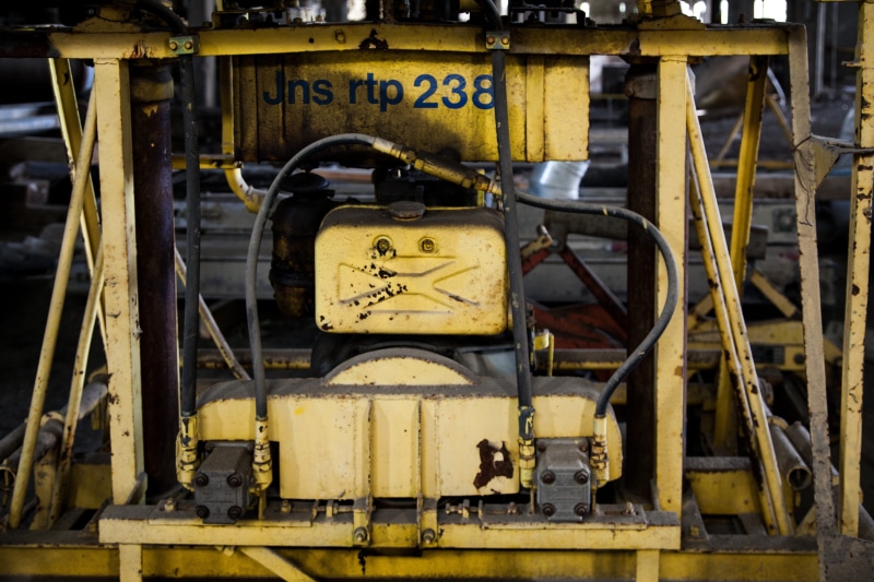 mode of transportation, no people, broken, exterior, aluminum, rusty, day, build, railroad track, industrial equipment, window, text, nobody, steel, fort