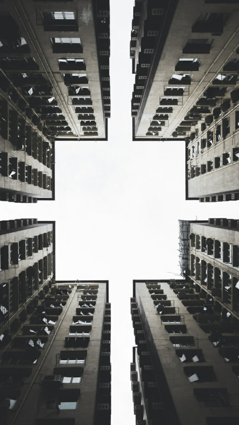 no people, modern, residential district, nature, concrete, photography, outdoors, building, building exterior, gray, window, directly below, buildings