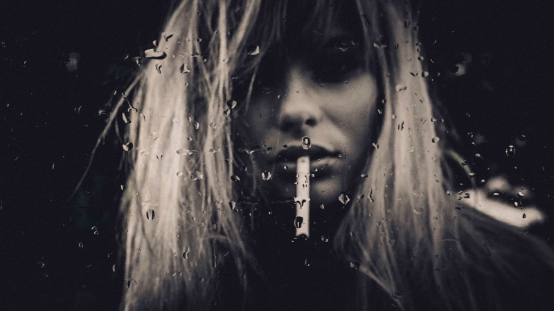 indoors, young adult, wet, portrait, contemplation, front view, cigarette, looking at viewer, smoking, dark, human face, close-up, hairstyle, one person
