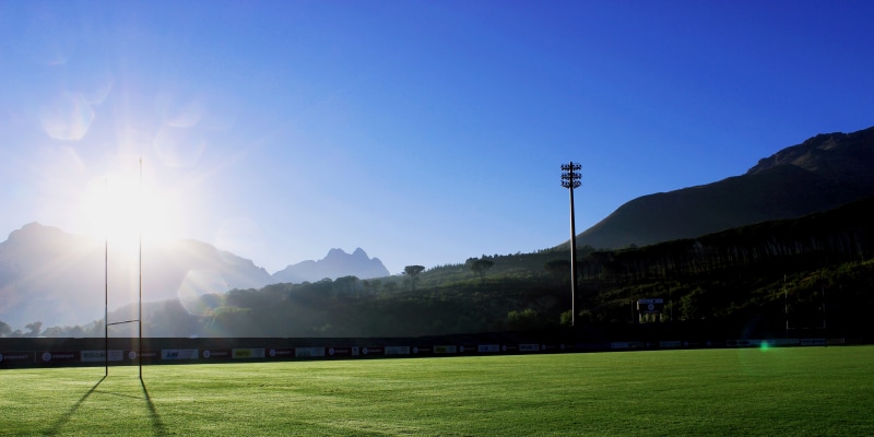 rugby player, playing field, scrum, lens flare, no people, soccer field, player, rugby, day, floodlight, team sport, grass, beauty in nature, plant, stadium
