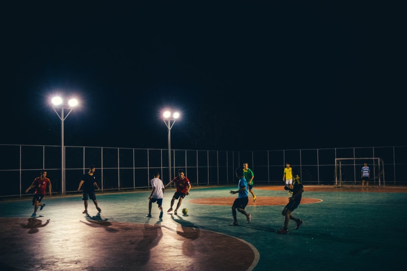 competitive Sport, men, playing, real people, sports team, person, Street Football, competition, sport, group Of People, illuminated, motion, outdoors