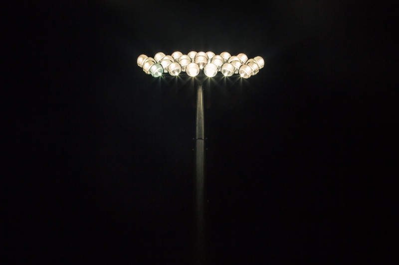 untitled, black background, light pole, low angle view, background, street, pitch, illuminated, copy space, floodlit, street light, lighting equipment